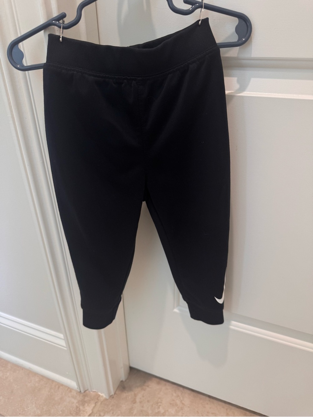 Baby black Nike joggers. Size 24 months.